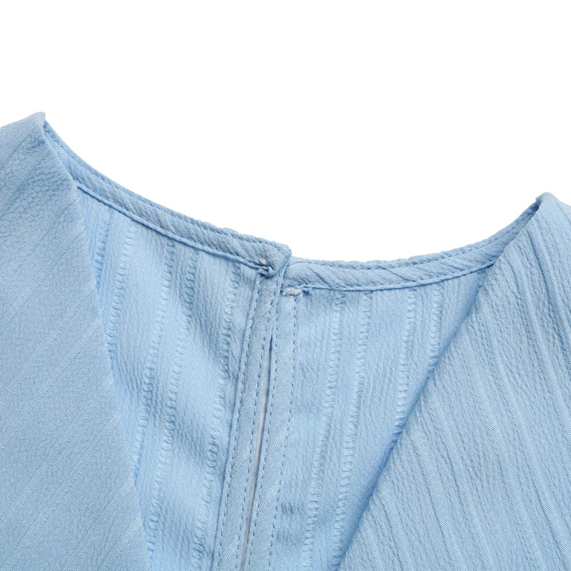 JIM & NORA Light blue temperament V-neck jumpsuit