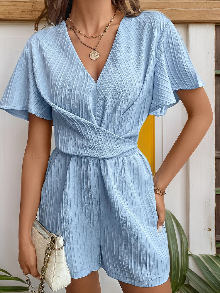 JIM & NORA Light blue temperament V-neck jumpsuit